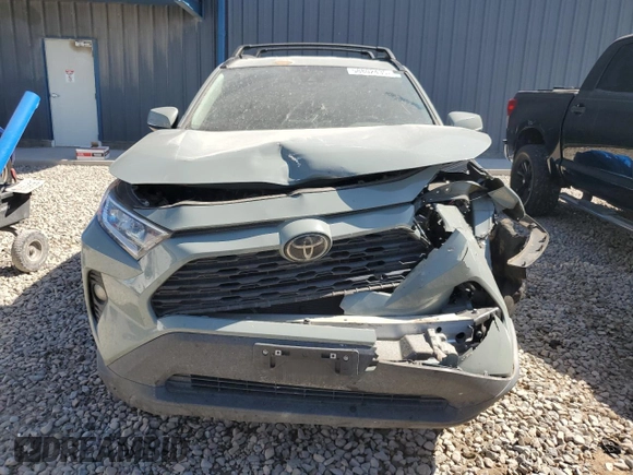 2021 Toyota RAV4 XLE with VIN 2T3W1RFV4MW134798, listed as a Copart auction lot 58802435 with 74,495 mi miles and Salvage title. Bid and sale history available at DreamBid. Image 5.