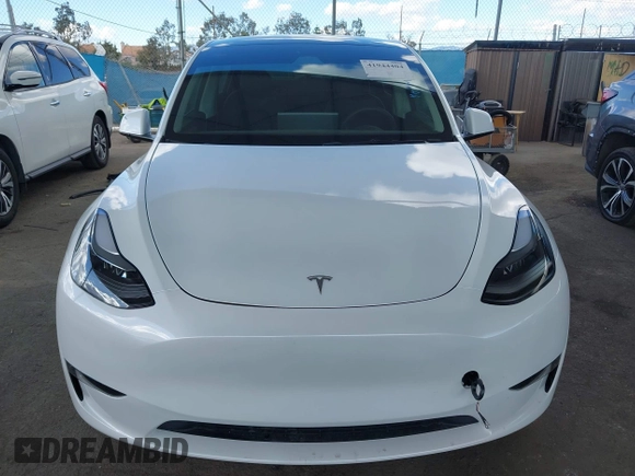 2024 Tesla Model Y Long Range with VIN 7SAYGDEE5RA222333, listed as a IAAI auction lot 41944404 with 12,176 mi miles. Bid and sale history available at carsss.com. Image 13.