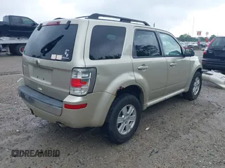 2010 Mercury Mariner with VIN 4M2CN8B73AKJ05123, listed as a IAAI auction lot 42512923 with 240,736 mi miles and . Bid and sale history available at DreamBid. Image 4.