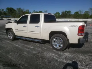 2013 GMC Sierra 1500 SLT with VIN 3GTP2WE70DG252706, listed as a Copart auction lot 52069795 with 145,677 mi miles and Salvage Title. Bid and sale history available at carsss.com. Image 2.