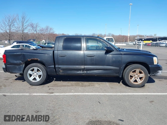 2007 Dodge Dakota SLT z VIN 1D7HW48JX7S196121, wystawiony jako IAAI lot #41863734 z przebiegiem 148 720 mil mil oraz . Historia ofert i sprzedaży dostępna na DreamBid. Obrazek 13.