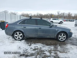 2003 Audi A4 3.0L with VIN WAULT68E73A150996, listed as a IAAI auction lot 41289003 with 119,657 mi miles. Bid and sale history available at carsss.com. Image 13.
