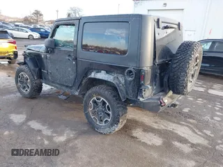 2009 Jeep Wrangler Rubicon with VIN 1J8GA641X9L706706, listed as a IAAI auction lot 41520129 with 176,345 mi miles. Bid and sale history available at carsss.com. Image 3.