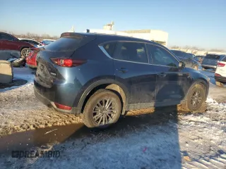 2021 Mazda CX-5 Touring with VIN JM3KFACM2M0329646, listed as a Copart auction lot 88217245 with 46,864 mi miles and Salvage Title. Bid and sale history available at carsss.com. Image 3.