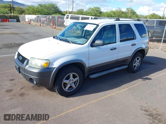 2006 Ford Escape XLT with VIN 1FMCU03116KA05836, listed as a IAAI auction lot 42310284 with 128,620 mi miles and . Bid and sale history available at DreamBid. Image 2.