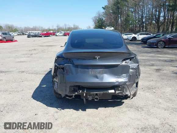 2021 Tesla Model Y Long Range with VIN 5YJYGDEE4MF119249, listed as a IAAI auction lot 41764711 with 87,796 mi miles. Bid and sale history available at carsss.com. Image 17.
