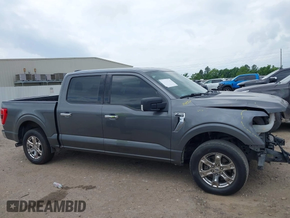2021 Ford F-150 XL with VIN 1FTEW1CP1MKD21526, listed as a IAAI auction lot 42104907 with 76,317 mi miles and . Bid and sale history available at DreamBid. Image 14.