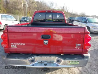 2006 Dodge Dakota SLT with VIN 1D7HW42N16S525329, listed as a IAAI auction lot 40920101 with 124,535 mi miles and . Bid and sale history available at carsss.com. Image 16.