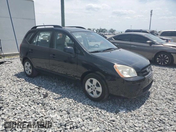 2009 Kia Rondo LX with VIN KNAFG528097250880, listed as a Copart auction lot 52632615 with 127,228 mi miles and Salvage Title. Bid and sale history available at carsss.com. Image 4.