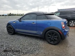 2014 MINI Coupe S z VIN WMWSX3C59ET772948, wystawiony jako Copart lot #81220834 z przebiegiem 99 211 mil mil oraz Szkody całkowita. Historia ofert i sprzedaży dostępna na DreamBid. Obrazek 2.