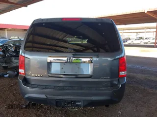 2012 Honda Pilot EX-L with VIN 5FNYF4H60CB050792, listed as a IAAI auction lot 41408058 with 244,847 mi miles. Bid and sale history available at carsss.com. Image 16.