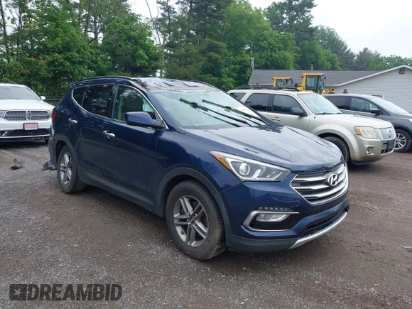 2017 Hyundai Santa Fe 2.4L z VIN 5XYZUDLB9HG421284, wystawiony jako IAAI lot #42441436 z przebiegiem 96 155 mil mil oraz . Historia ofert i sprzedaży dostępna na DreamBid. Obrazek 1.