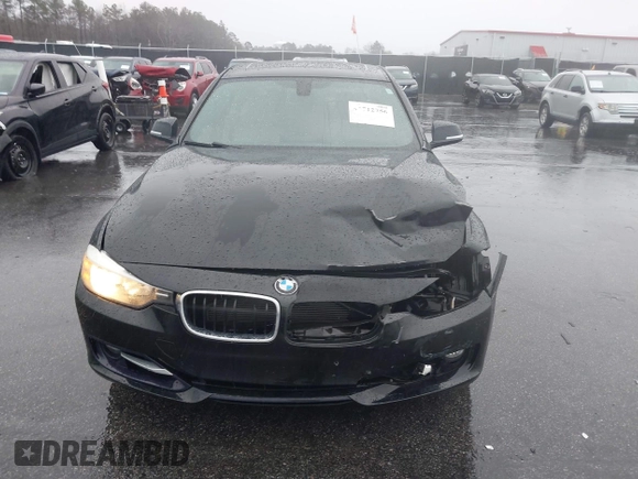 2015 BMW 3 Series 328i with VIN WBA3A5G54FNS88834, listed as a IAAI auction lot 41712756 with 51,599 mi miles. Bid and sale history available at carsss.com. Image 12.