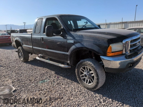 1999 Ford F-250 XL with VIN 1FTNX21FXXEC98957, listed as a Copart auction lot 61476665 with 414,070 mi miles and Salvage title. Bid and sale history available at DreamBid. Image 4.