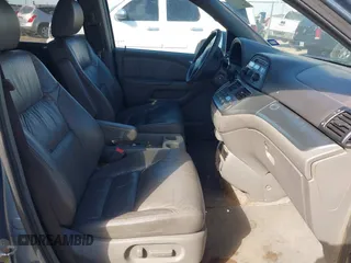 2010 Honda Odyssey EX-L with VIN 5FNRL3H7XAB052742, listed as a IAAI auction lot 41705935 with 205,190 mi miles and . Bid and sale history available at DreamBid. Image 5.