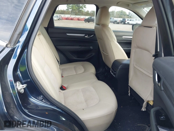 2018 Mazda CX-5 Touring z VIN JM3KFACM0J1389057, wystawiony jako IAAI lot #40922679 z przebiegiem 140 026 mil mil oraz . Historia ofert i sprzedaży dostępna na DreamBid. Obrazek 8.