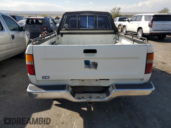 1993 Toyota Pickup DLX z VIN JT4VN13D3P5125406, wystawiony jako Copart lot #75011624 z przebiegiem 152 663 mil mil oraz Szkoda całkowita • Salvage title. Historia ofert i sprzedaży dostępna na DreamBid. Obrazek 6.
