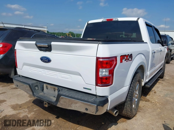 2018 Ford F-150 XL with VIN 1FTEW1EP9JKE58173, listed as a IAAI auction lot 42389998 with 129,512 mi miles and . Bid and sale history available at DreamBid. Image 4.