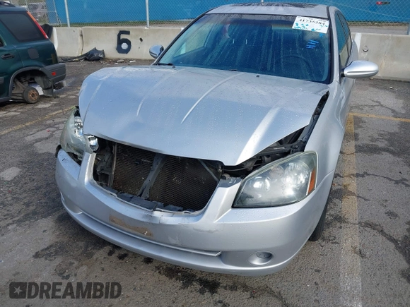 2006 Nissan Altima 2.5 with VIN 1N4AL11D66N366825, listed as a IAAI auction lot 41735284 with 169,131 mi miles. Bid and sale history available at carsss.com. Image 6.