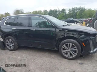 2022 Cadillac XT6 Premium Luxury with VIN 1GYKPDRS5NZ149971, listed as a IAAI auction lot 42259140 with 51,704 mi miles and . Bid and sale history available at DreamBid. Image 13.