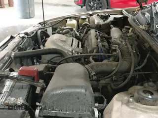 1998 Toyota Camry LE z VIN JT2BG22K2W0105087, wystawiony jako IAAI lot #43316030 z przebiegiem 176 929 mil mil oraz . Historia ofert i sprzedaży dostępna na DreamBid. Obrazek 22.