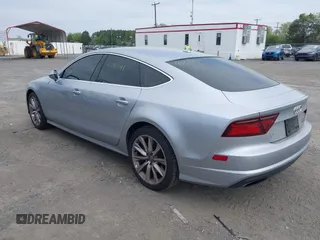 2016 Audi A7 Prestige z VIN WAU2GAFC6GN007637, wystawiony jako IAAI lot #42084141 z przebiegiem 131 213 mil mil oraz . Historia ofert i sprzedaży dostępna na DreamBid. Obrazek 3.