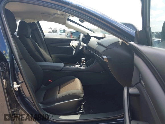 2021 Mazda 3 S z VIN JM1BPAAL6M1331460, wystawiony jako IAAI lot #42197743 z przebiegiem 53 972 mil mil oraz . Historia ofert i sprzedaży dostępna na DreamBid. Obrazek 5.