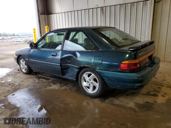 1996 Ford Escort z VIN 1FASP11J0TW123967, wystawiony jako Copart lot #52859835 z przebiegiem 164 693 mil mil oraz Szkoda całkowita • Salvage title. Historia ofert i sprzedaży dostępna na DreamBid. Obrazek 2.