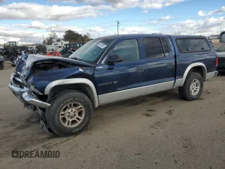 2001 Dodge Dakota Sport with VIN 1B7GG2ANX1S159436, listed as a Copart auction lot 80347854 with 203,253 mi miles and Salvage Title. Bid and sale history available at carsss.com. Image 1.