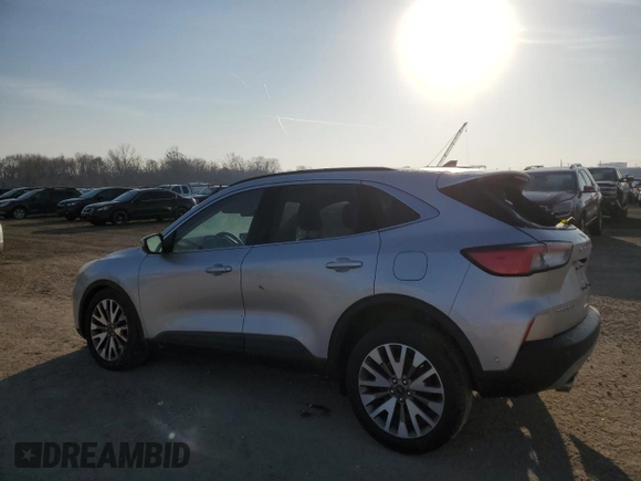 2020 Ford Escape Titanium Hybrid z VIN 1FMCU9DZ4LUC34827, wystawiony jako Copart lot #48769685 z przebiegiem 84 218 mil mil oraz Szkoda całkowita • Salvage title. Historia ofert i sprzedaży dostępna na DreamBid. Obrazek 2.