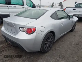 2014 Scion FR-S with VIN JF1ZNAA10E9703306, listed as a IAAI auction lot 42011748 with 83,128 mi miles and . Bid and sale history available at DreamBid. Image 4.