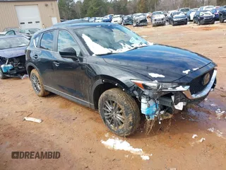 2020 Mazda CX-5 Touring z VIN JM3KFBCMXL1741182, wystawiony jako IAAI lot #41602315 z przebiegiem 31 582 mil mil oraz . Historia ofert i sprzedaży dostępna na DreamBid. Obrazek 1.