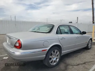 2004 Jaguar XJ Vanden Plas with VIN SAJWA74C04SG25291, listed as a Copart auction lot 56678255 with 176,597 mi miles and Clean Title. Bid and sale history available at DreamBid. Image 3.