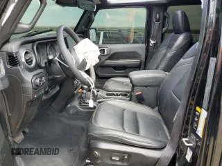 2024 Jeep Wrangler Sahara with VIN 1C4RJXP60RW116607, listed as a Copart auction lot 54562695 with 62,352 mi miles and Salvage title. Bid and sale history available at DreamBid. Image 7.