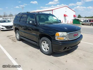 2004 GMC Yukon Denali with VIN 1GKEK63U54J308934, listed as a IAAI auction lot 42124676 with 254,362 mi miles. Bid and sale history available at carsss.com. Image 1.