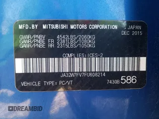 2015 Mitsubishi Lancer Evolution Final Edition z VIN JA32W7FV7FU608214, wystawiony jako Copart lot #68316174 z przebiegiem 56 714 mil mil oraz Szkody całkowita. Historia ofert i sprzedaży dostępna na DreamBid. Obrazek 13.