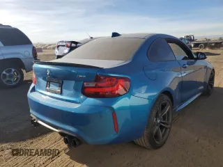 2016 BMW M2 with VIN WBS1H9C52GV351930, listed as a Copart auction lot 86610764 with 55,473 mi miles and Salvage Title. Bid and sale history available at carsss.com. Image 3.