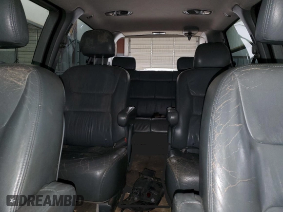 2003 Honda Odyssey EX-L z VIN 5FNRL18993B142649, wystawiony jako Copart lot #86397154 z przebiegiem 339 966 mil mil oraz Szkoda całkowita • Salvage title. Historia ofert i sprzedaży dostępna na DreamBid. Obrazek 10.