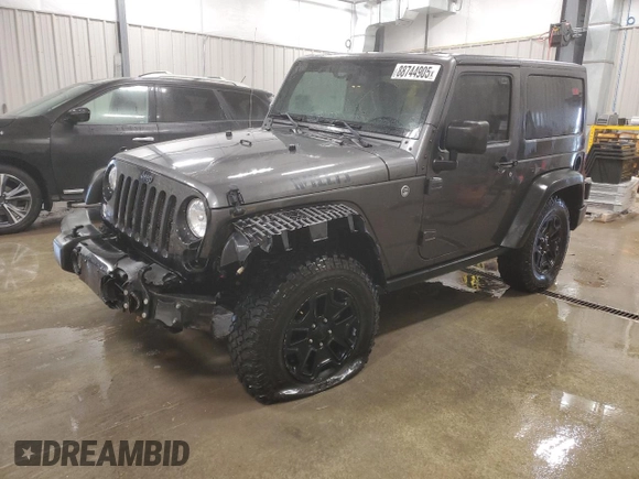 2017 Jeep Wrangler Willys Wheeler with VIN 1C4AJWAG9HL696710, listed as a Copart auction lot 88744905 with 66,800 mi miles and Salvage Title. Bid and sale history available at DreamBid. Image 1.