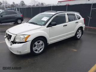 2008 Dodge Caliber SE with VIN 1B3HB28B18D782460, listed as a IAAI auction lot 41559904 with 167,195 mi miles. Bid and sale history available at carsss.com. Image 2.