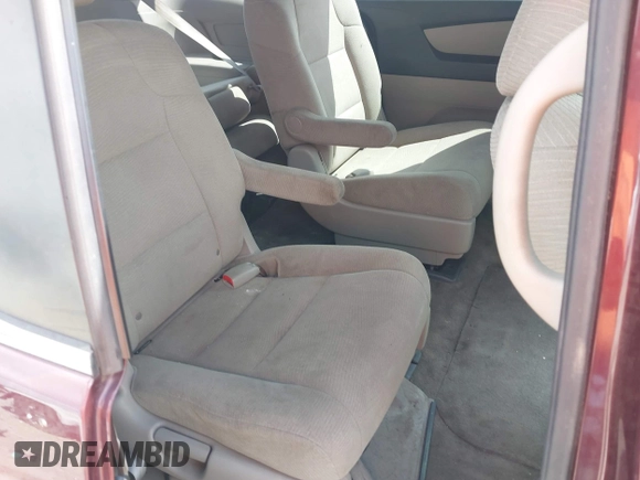 2013 Honda Odyssey LX with VIN 5FNRL5H28DB058401, listed as a IAAI auction lot 42050892 with 221,016 mi miles and . Bid and sale history available at carsss.com. Image 8.