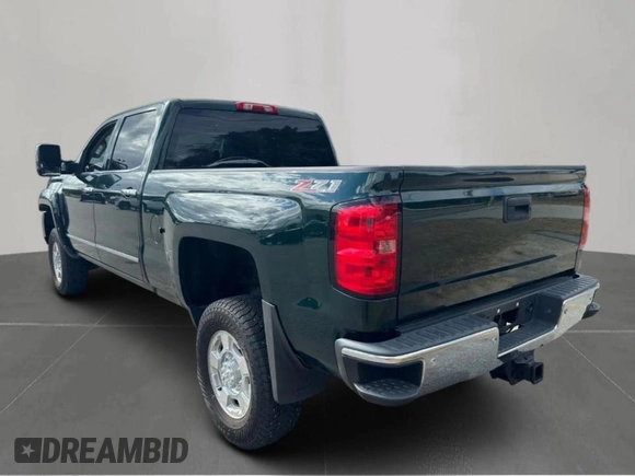 2015 GMC Sierra 2500HD available WiFi SLT with VIN 1GT12ZE82FF581685, listed as a Copart auction lot 54453955 with 185,110 mi miles and Clean Title. Bid and sale history available at carsss.com. Image 3.