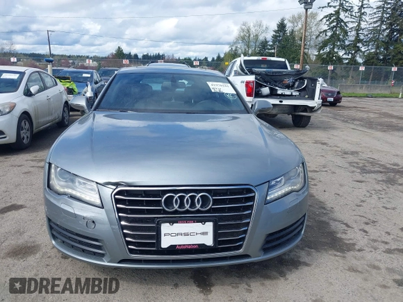 2014 Audi A7 Premium Plus z VIN WAUWGAFC4EN160144, wystawiony jako IAAI lot #41970181 z przebiegiem 118 761 mil mil oraz . Historia ofert i sprzedaży dostępna na DreamBid. Obrazek 12.