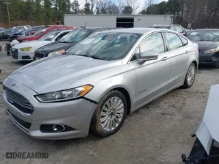 2015 Ford Fusion SE Hybrid with VIN 3FA6P0LU2FR166877, listed as a IAAI auction lot 41586973 with 58,428 mi miles. Bid and sale history available at carsss.com. Image 2.