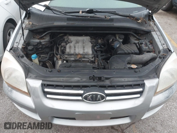 2005 Kia Sportage LX with VIN KNDJE723257071317, listed as a IAAI auction lot 41547643 with 267,610 mi miles and . Bid and sale history available at carsss.com. Image 10.