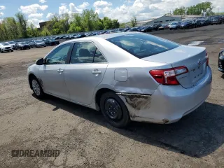 2014 Toyota Camry L with VIN 4T4BF1FK1ER390579, listed as a Copart auction lot 55284295 with 133,926 mi miles and Salvage Title. Bid and sale history available at DreamBid. Image 2.