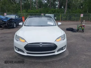 2013 Tesla Model S Performance with VIN 5YJSA1DP9DFP04076, listed as a IAAI auction lot 42185465 with 179,640 mi miles and . Bid and sale history available at DreamBid. Image 12.