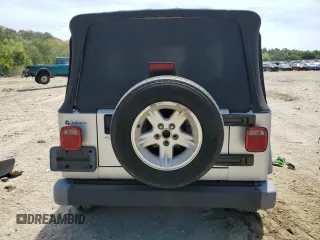 2004 Jeep Wrangler Sport with VIN 1J4FA49S44P788467, listed as a Copart auction lot 55395625 with 187,289 mi miles and Salvage title. Bid and sale history available at DreamBid. Image 6.