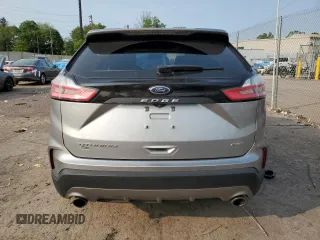 2021 Ford Edge Titanium with VIN 2FMPK4K91MBA12380, listed as a Copart auction lot 59275785 with 82,295 mi miles and Salvage title. Bid and sale history available at DreamBid. Image 6.