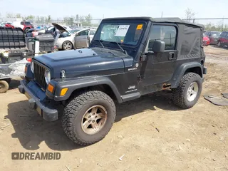 2006 Jeep Wrangler Sport with VIN 1J4FA49S76P718349, listed as a IAAI auction lot 42098356 with 137,804 mi miles and . Bid and sale history available at carsss.com. Image 2.